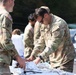 U.S. Army Soldiers assigned to the Bravo Company, 1st Battalion, 325th Airborne Infantry Regiment, 82nd Airborne Division, serve hot meals to local communities.