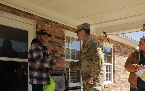 U.S. Army Soldiers assigned to the Bravo Company, 1st Battalion, 325th Airborne Infantry Regiment, 82nd Airborne Division, serve hot meals to local communities.