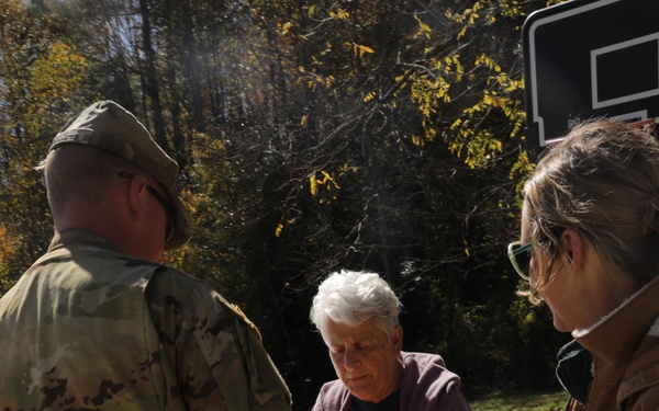 U.S. Army Soldiers assigned to the Bravo Company, 1st Battalion, 325th Airborne Infantry Regiment, 82nd Airborne Division, serve hot meals to local communities.
