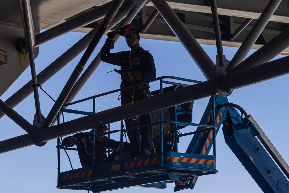 Wasp Sailors Weld Aircraft Elevator During MDVR