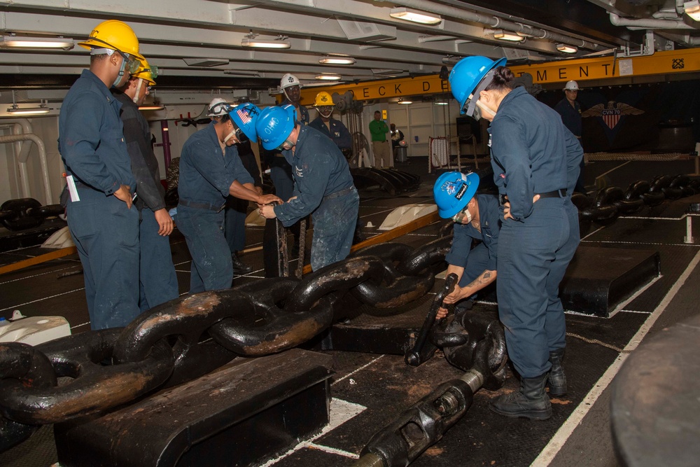 Sailors Prepare to Lower the Anchor in the Foc’s’le