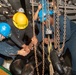 Sailors Prepare to Lower the Anchor in the Foc’s’le