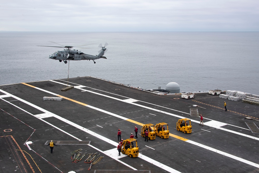 Sailors Conduct an Ammunition Handling Evolution on the Flight Deck