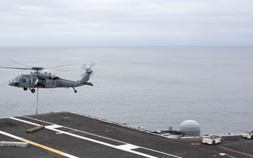 Sailors Conduct an Ammunition Handling Evolution on the Flight Deck