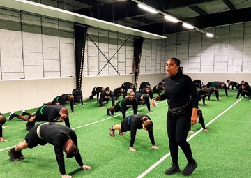 USAG Rheinland-Pfalz’s Family Advocacy Program team educates Soldiers through creative PT session for Domestic Violence Awareness Month