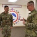 Retention NCO Receives Coin