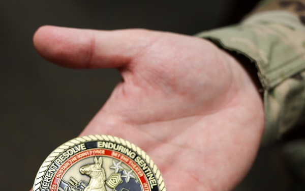 Retention NCO Receives Coin