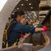 Aviation Ordnanceman performs maintenance on a Weapons Elevator