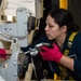 An Aviation Ordnanceman Performs Maintenance on a Weapons Elevator