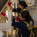 Sailors Perform Maintenance on a Weapons Elevator