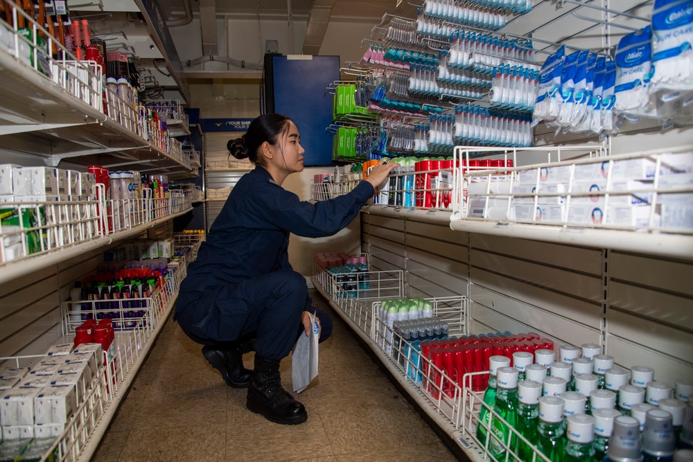 A Retail Services Specialist Conducts Inventory in the Ship Store