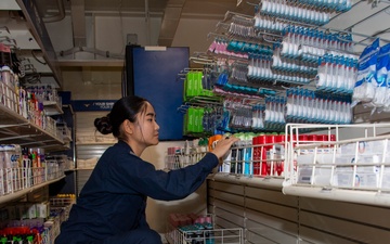 A Retail Services Specialist Conducts Inventory in the Ship Store