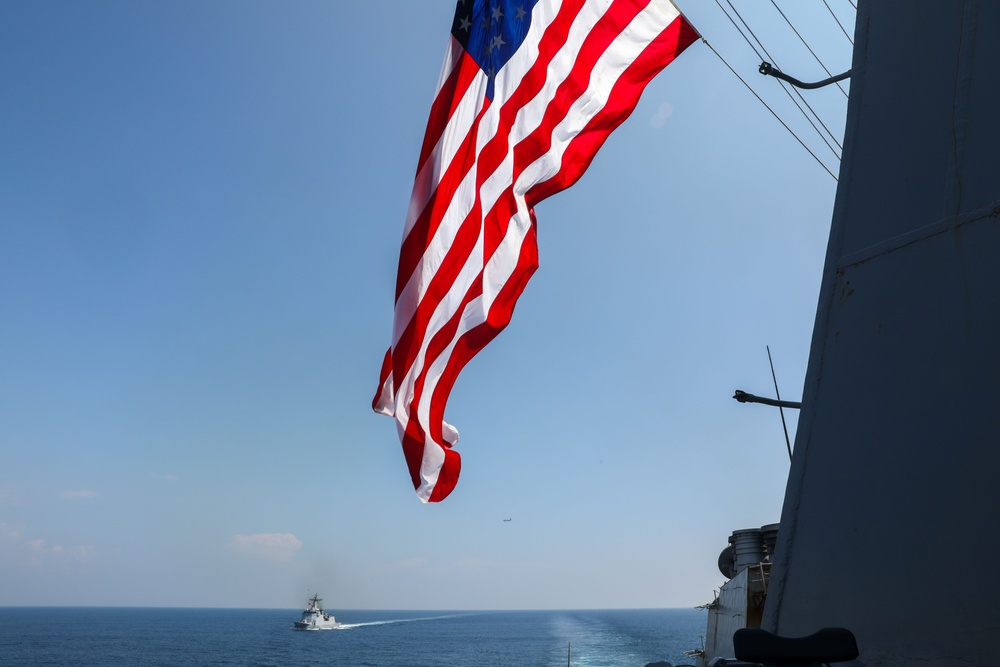 Sailors aboard USS Howard (DDG 83) conduct a replenishment-at-sea exercise during Sama Sama 2024