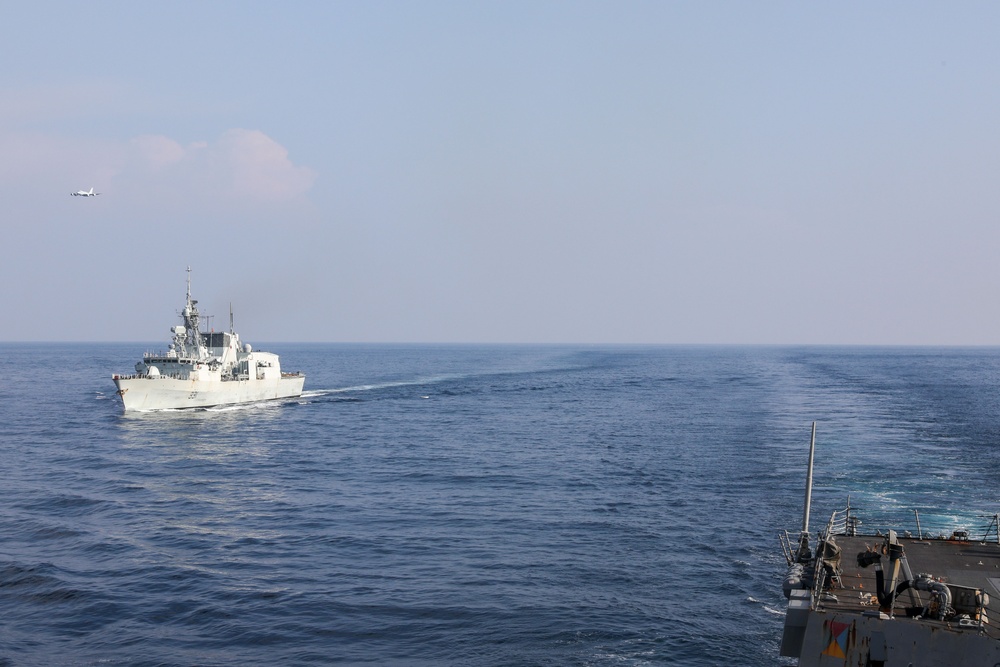 Sailors aboard USS Howard (DDG 83) conduct a replenishment-at-sea exercise during Sama Sama 2024