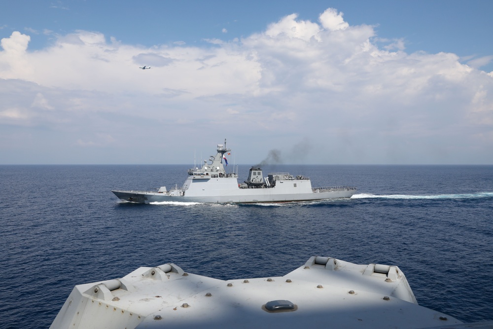 Sailors aboard USS Howard (DDG 83) conduct a replenishment-at-sea exercise during Sama Sama 2024