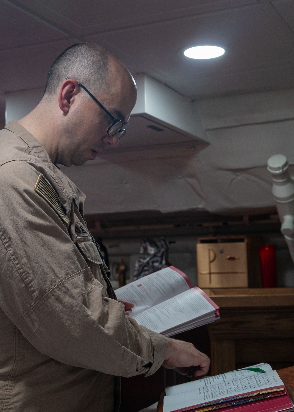 USS George Washington Sailors hold Catholic Mass