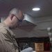USS George Washington Sailors hold Catholic Mass