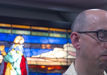 USS George Washington Sailors hold Catholic Mass