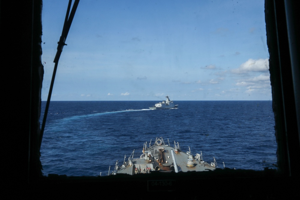 USS Howard (DDG 83) participates in an anti-submarine exercise during Sama Sama 2024 in the South China Sea