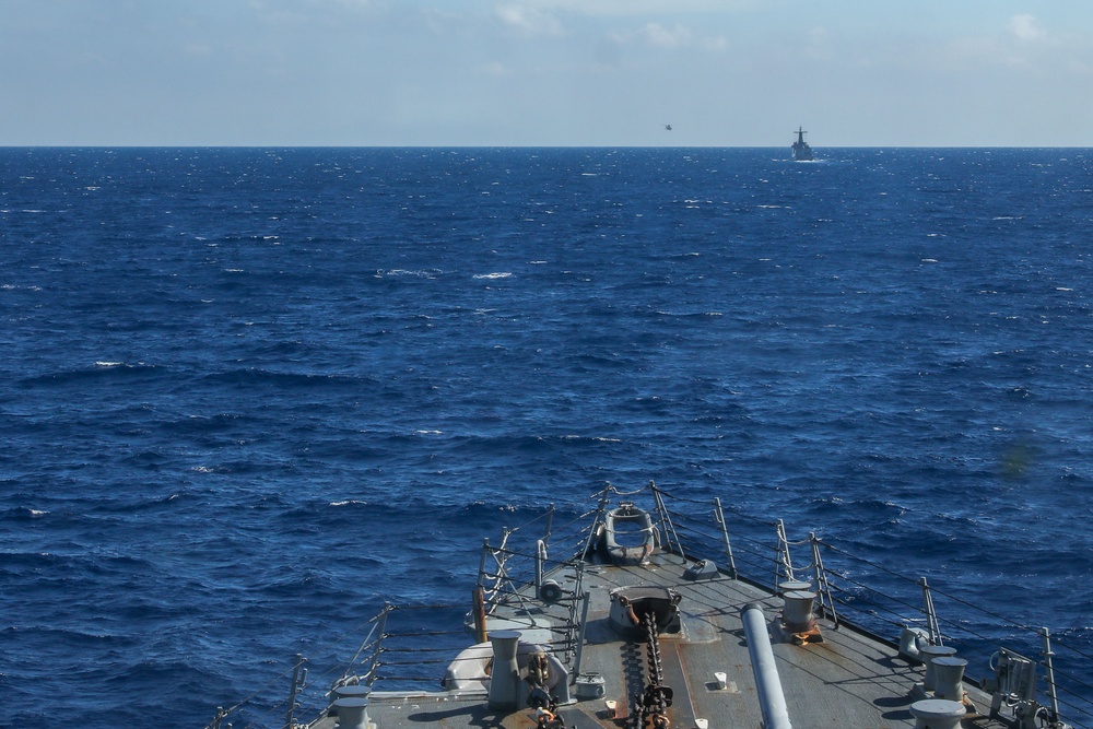 USS Howard (DDG 83) participates in an anti-submarine exercise during Sama Sama 2024 in the South China Sea