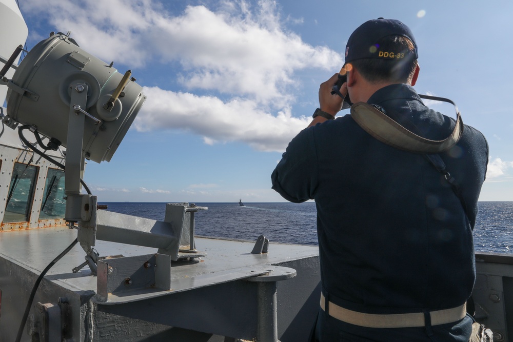 USS Howard (DDG 83) participates in an anti-submarine exercise during Sama Sama 2024 in the South China Sea