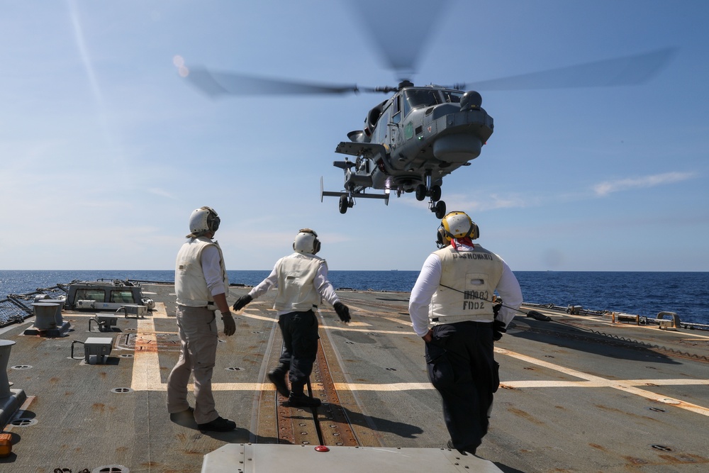 USS Howard conducts flight quarters with an AgustaWestland AW159 Wildcat helicopter from the BRP Jose Rizal during Sama Sama 2024 in the South China Sea