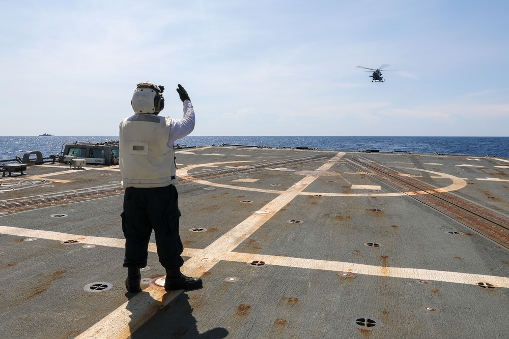 USS Howard conducts flight quarters with an AgustaWestland AW159 Wildcat helicopter from the BRP Jose Rizal during Sama Sama 2024 in the South China Sea