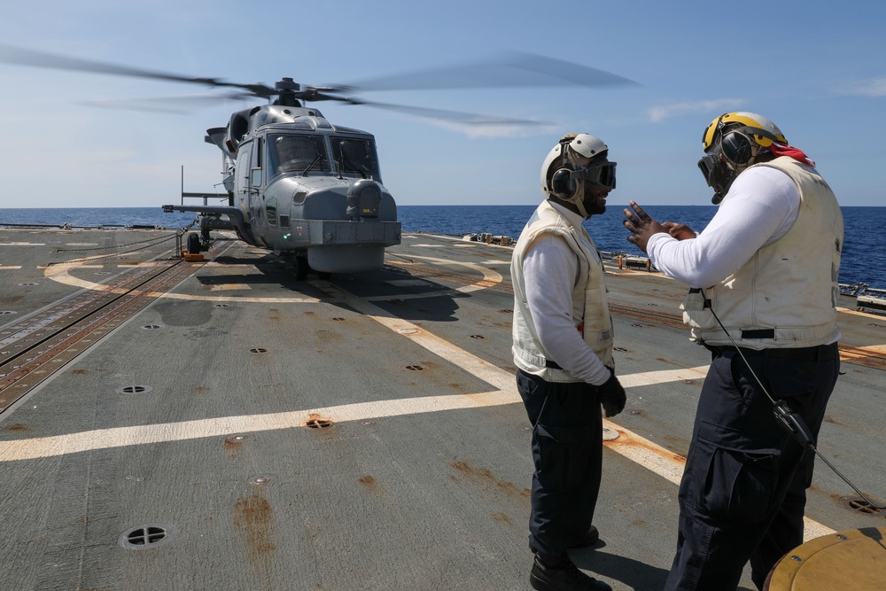 USS Howard conducts flight quarters with an AgustaWestland AW159 Wildcat helicopter from the BRP Jose Rizal during Sama Sama 2024 in the South China Sea