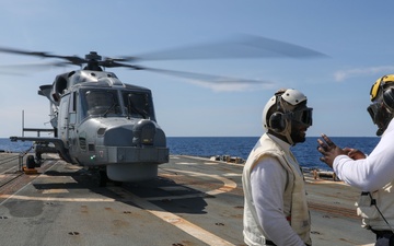 USS Howard conducts flight quarters with an AgustaWestland AW159 Wildcat helicopter from the BRP Jose Rizal during Sama Sama 2024 in the South China Sea