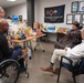 Director Gillums Visits the Association for Better Living and Education