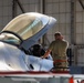 Maintainer Works on a F-16C