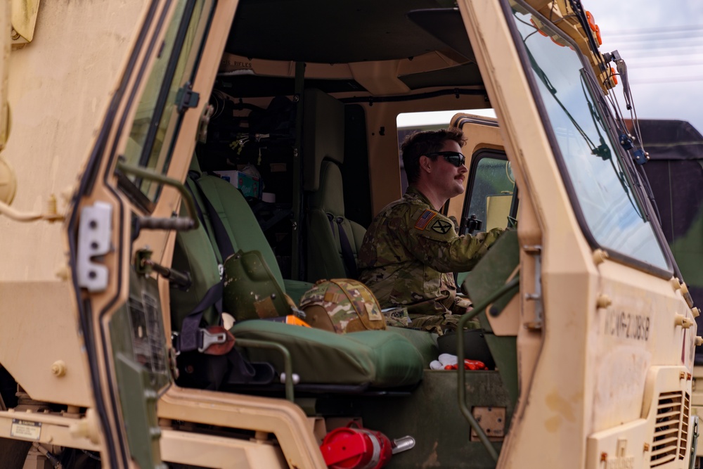 North Carolina National Guard soldiers prepare to transport supplies