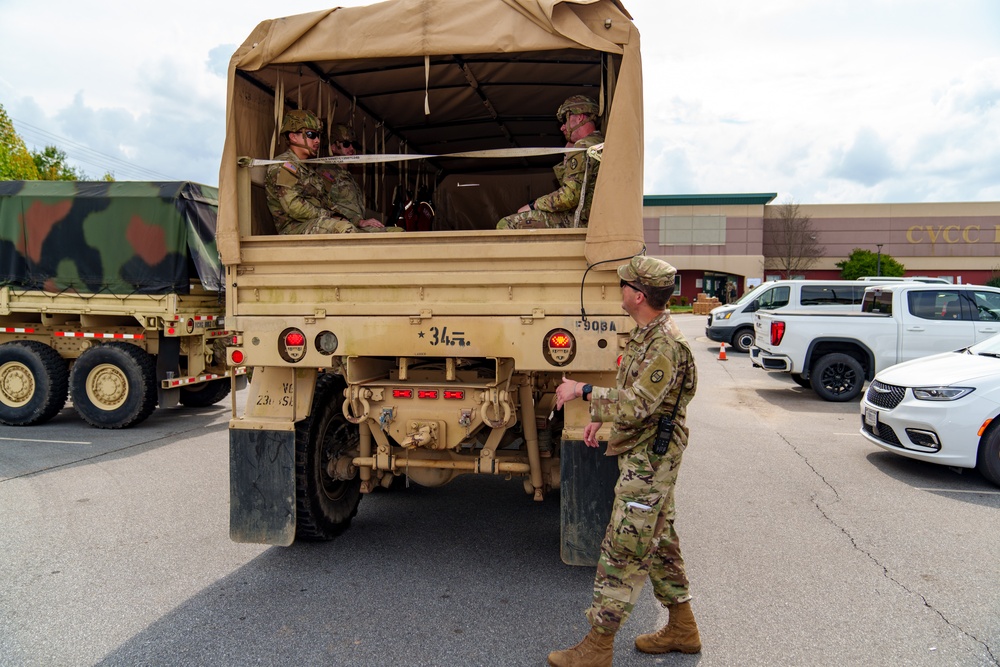 North Carolina National Guard soldiers prepare to transport supplies