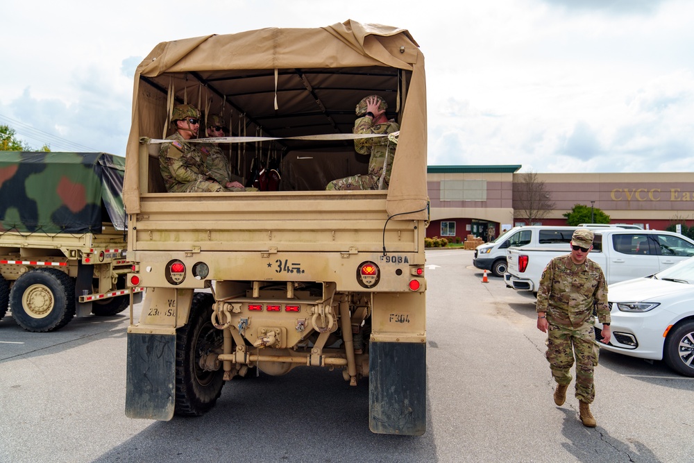 North Carolina National Guard soldiers prepare to transport supplies