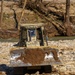 North Carolina National Guard Soldiers reinforce a temporary dirt roadway