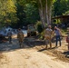 North Carolina National Guard Soldiers reinforce a temporary dirt roadway