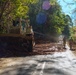 North Carolina National Guard Soldiers reinforce a temporary dirt roadway
