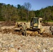 North Carolina National Guard Soldiers reinforce a temporary dirt roadway