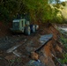 North Carolina National Guard soldiers reinforce a temporary dirt roadway
