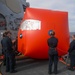 Sailors aboard the USS Howard make preparations for a gunnery exercise during Sama Sama 2024