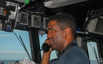 Sailors aboard the USS Howard make preparations for a gunnery exercise during Sama Sama 2024