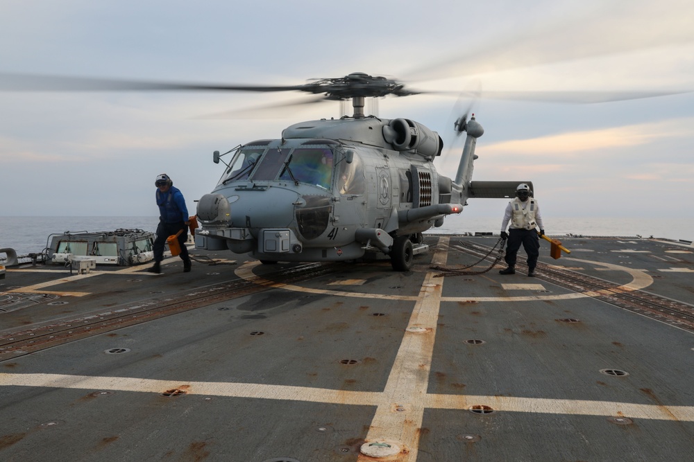 USS Howard conducts a maneuvering exercise during Sama Sama 2024