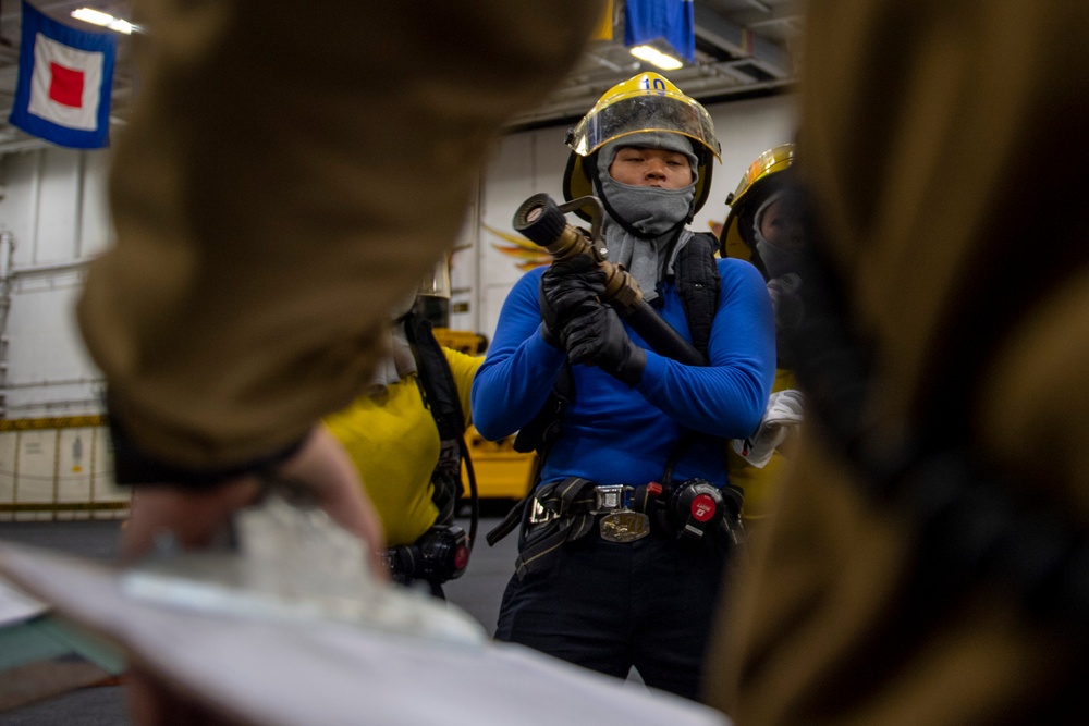 USS Carl Vinson (CVN 70) Sailors Participate in a General Quarters Drill