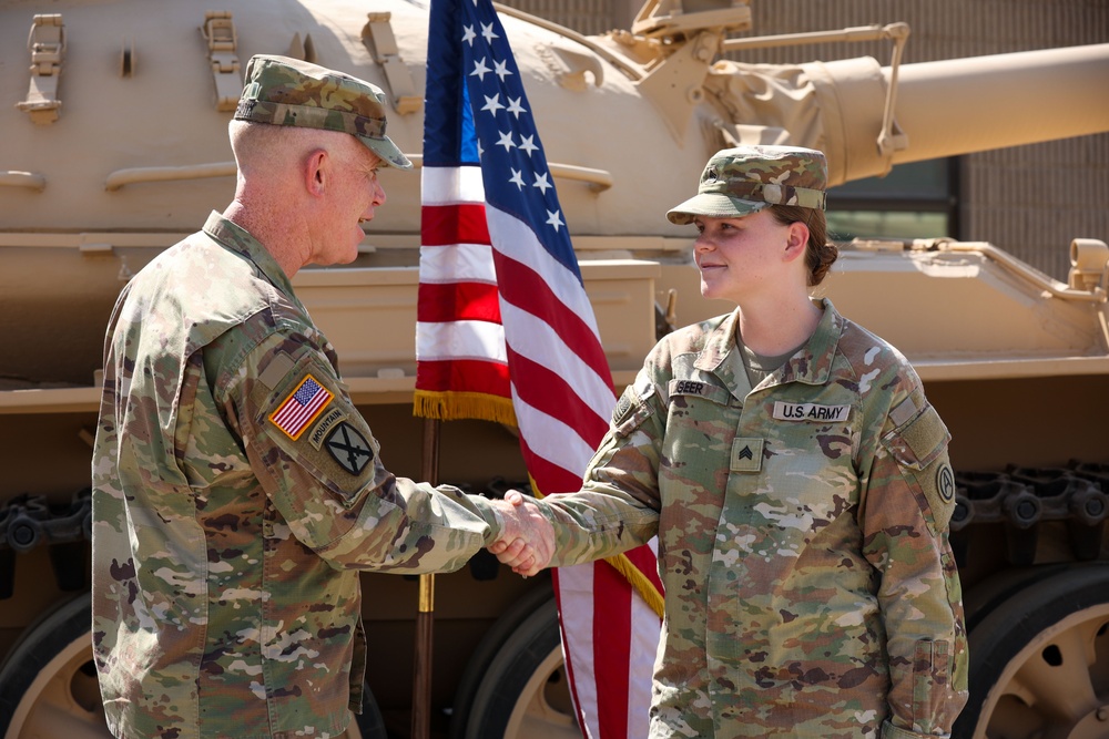 Lieutenant General Patrick Frank administers reenlistment