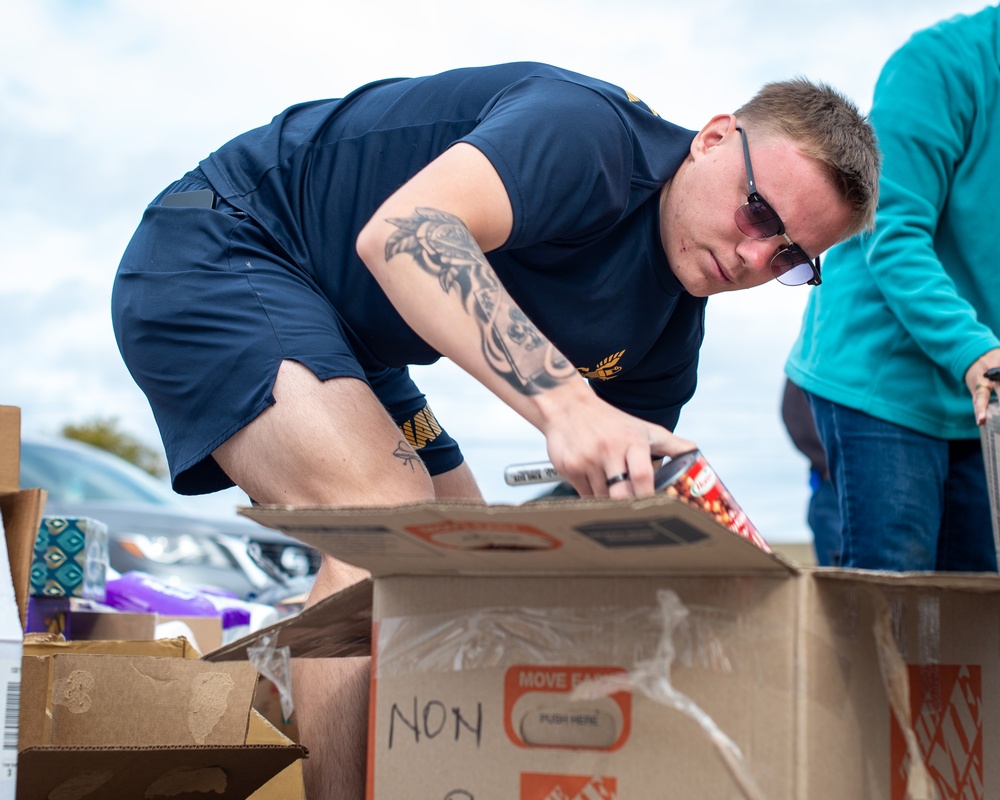 Sailors Prepare Consummables in Support of Hurricane Helene Relief