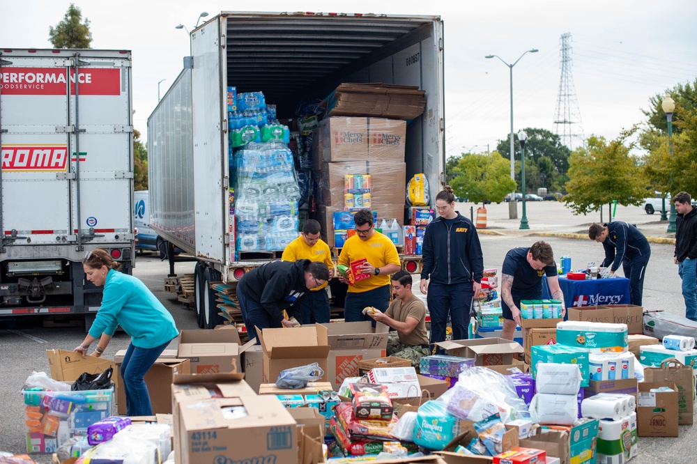 Sailors Prepare Consummables in Support of Hurricane Helene Relief