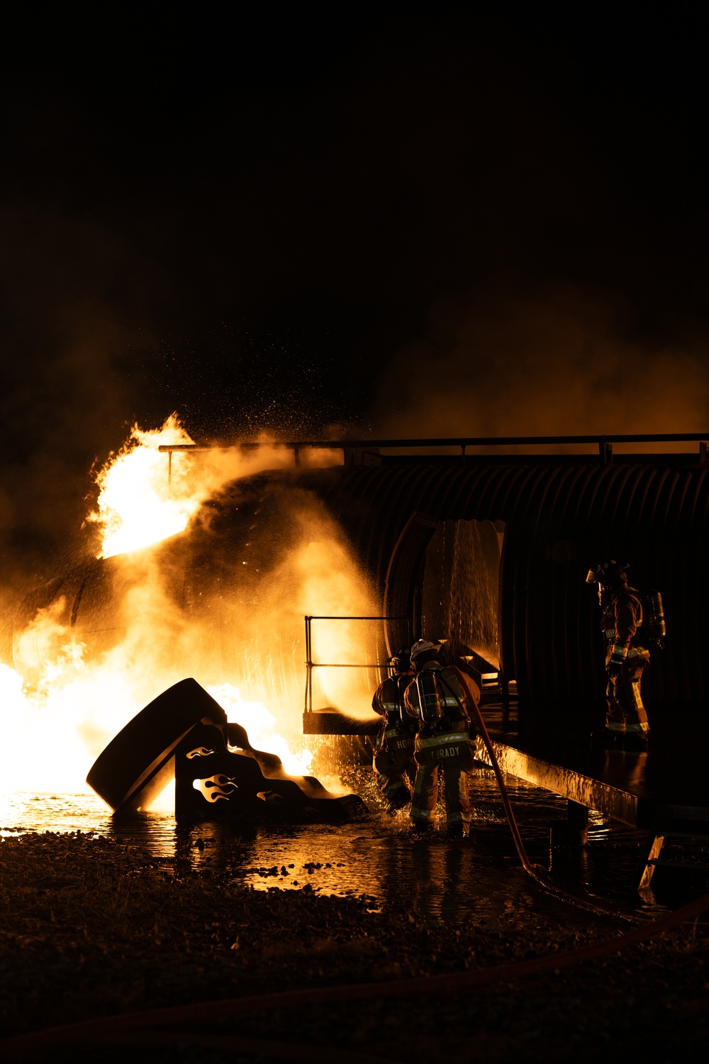 436th CES Fire and Emergency Services conducts night live fire training