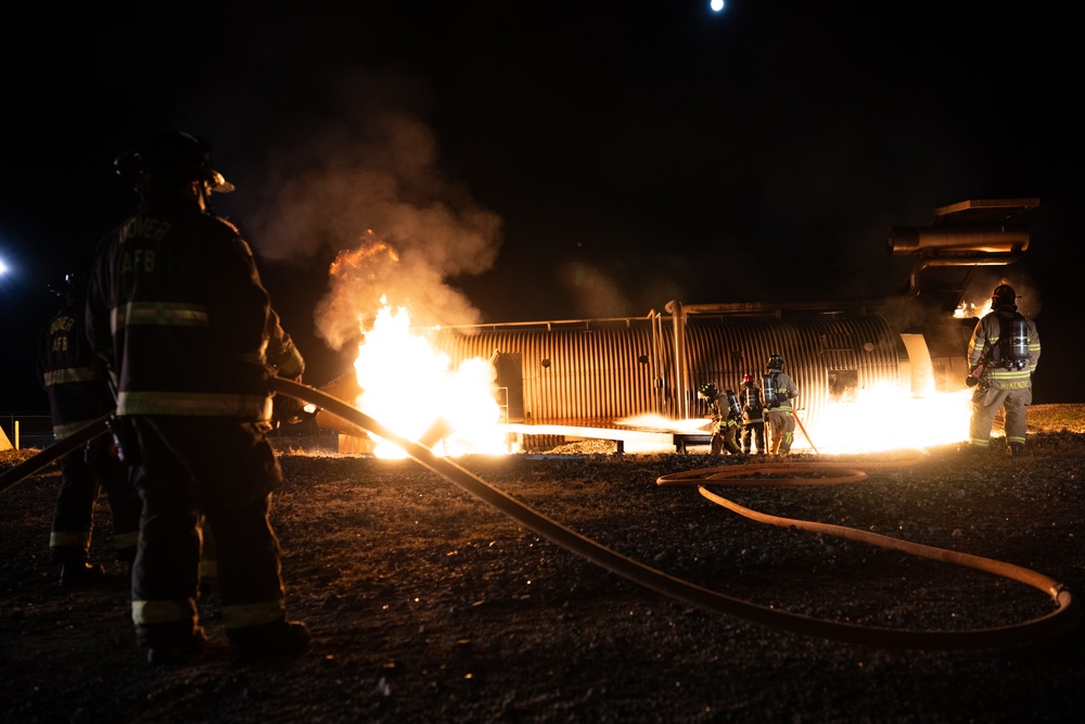 436th CES Fire and Emergency Services conducts night live fire training