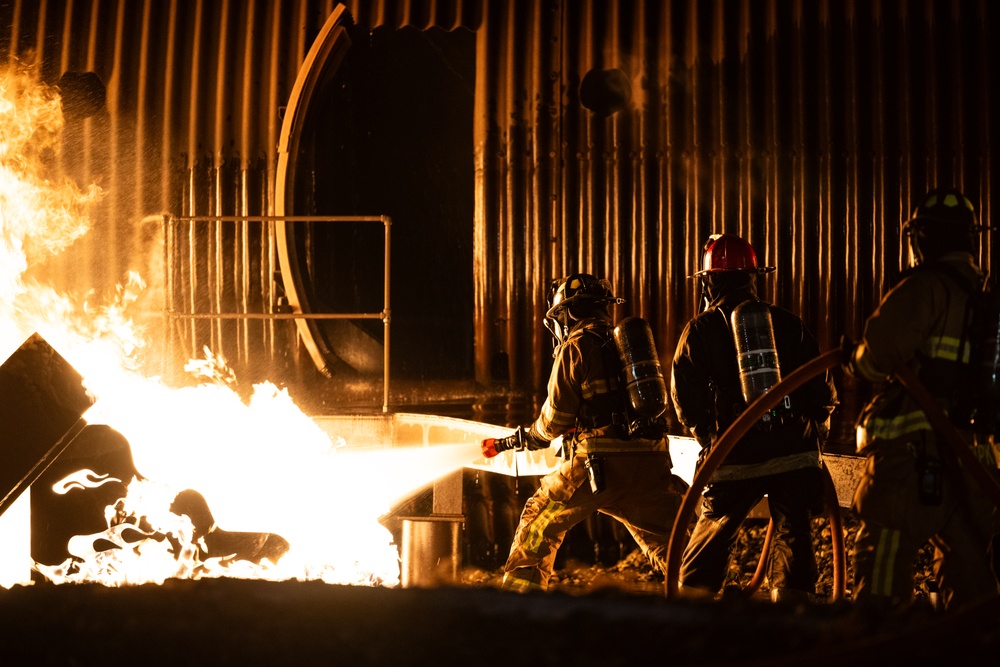 436th CES Fire and Emergency Services conducts night live fire training