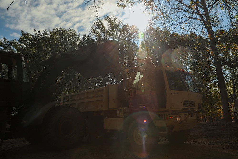 Tennessee Army National Guardsmen of the 278th clear debris in Greene County, Tennessee